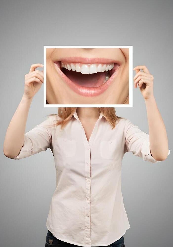 sonrisa feliz paciente clinica dental rivera alcorcon